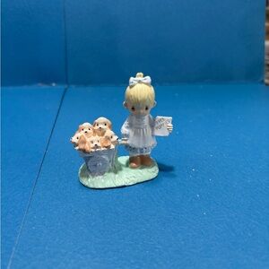 Adorable Figurine with Puppies